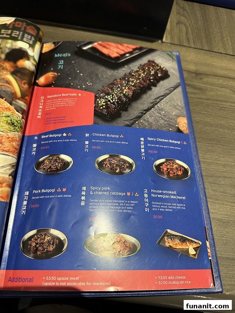 A menu page from Ajummas showcasing Korean meat and fish dishes with descriptions and prices.