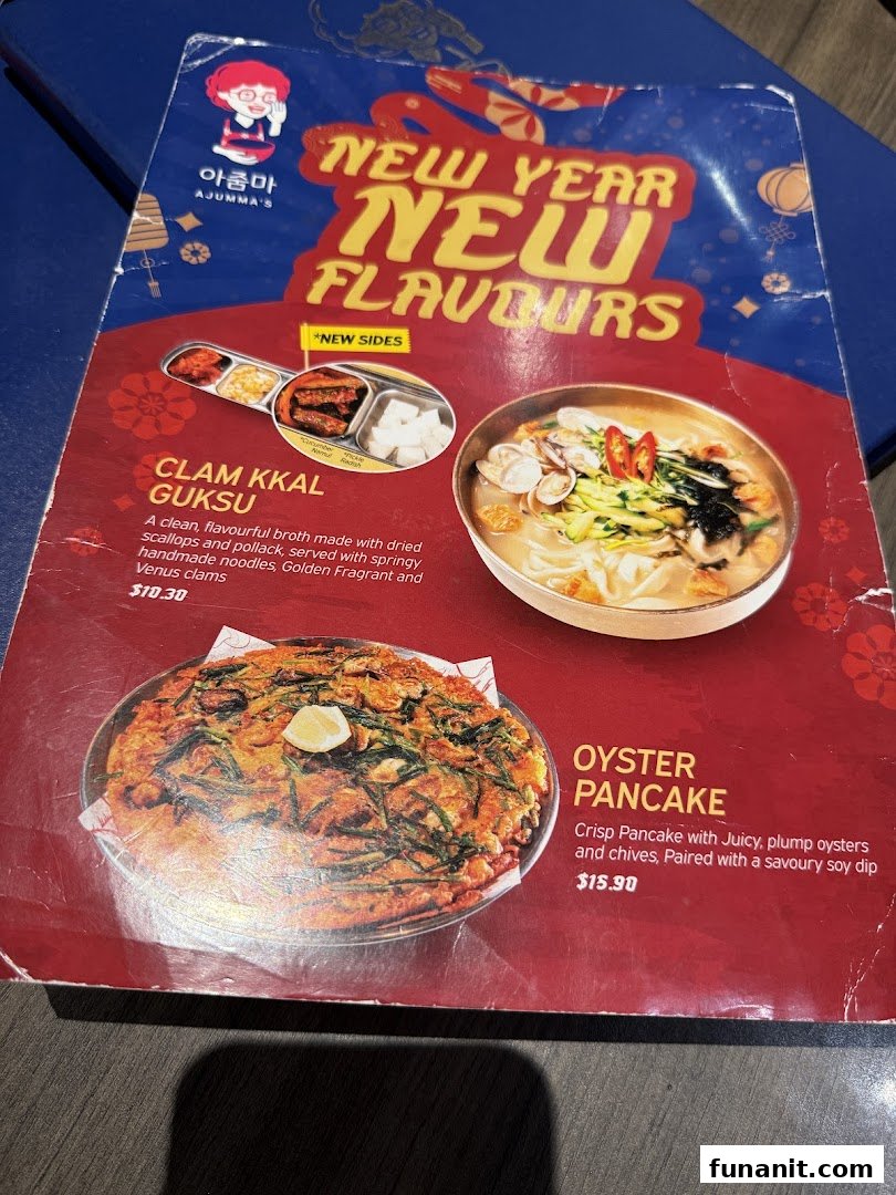 A menu page from Ajummas featuring New Year New Flavours specials like Clam Kkal Guksu and Oyster Pancake.