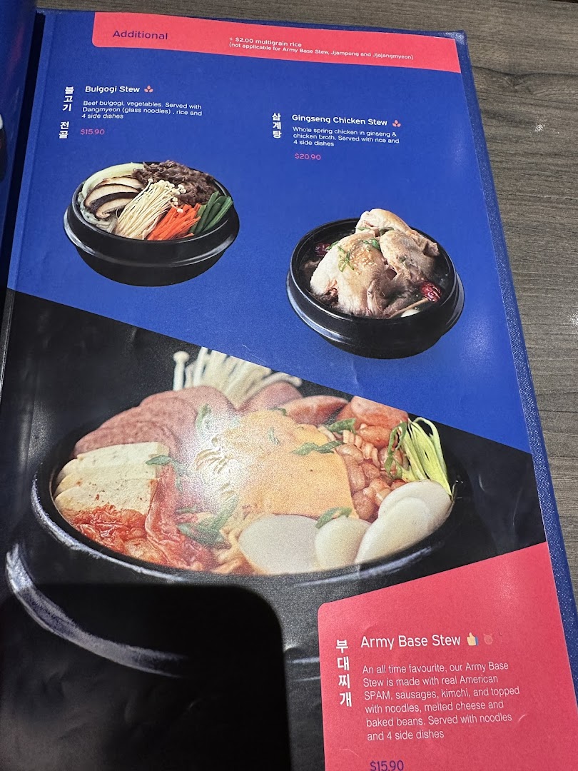A page from a Korean restaurant menu featuring various stews with descriptions and prices.