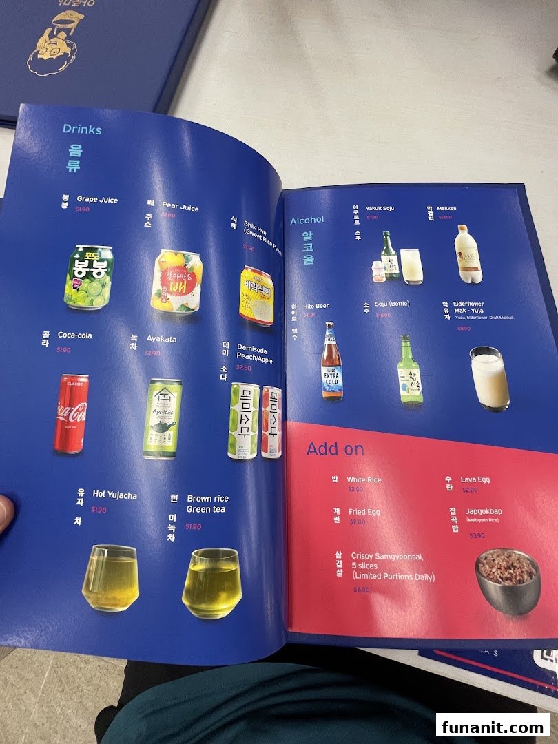 A detailed view of Ajummas' menu, showcasing a variety of drinks, alcoholic beverages, and add-on dishes.