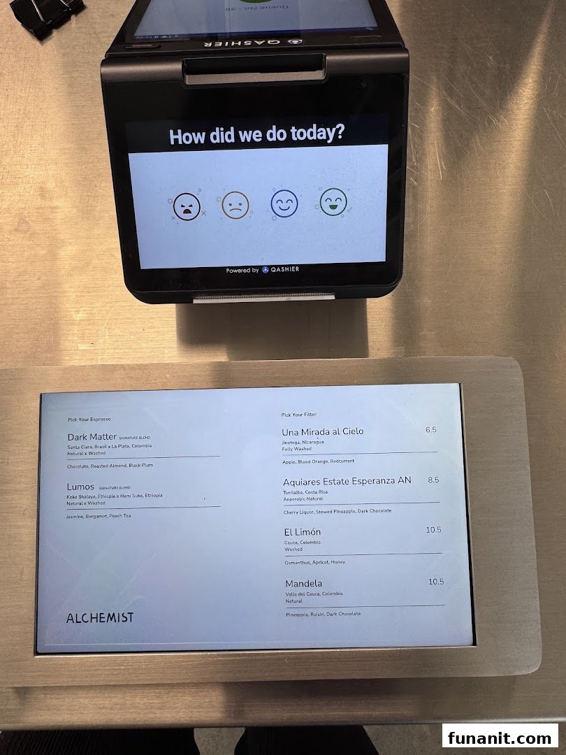 A digital menu display at Alchemist Funan showing espresso and filter coffee options with prices.