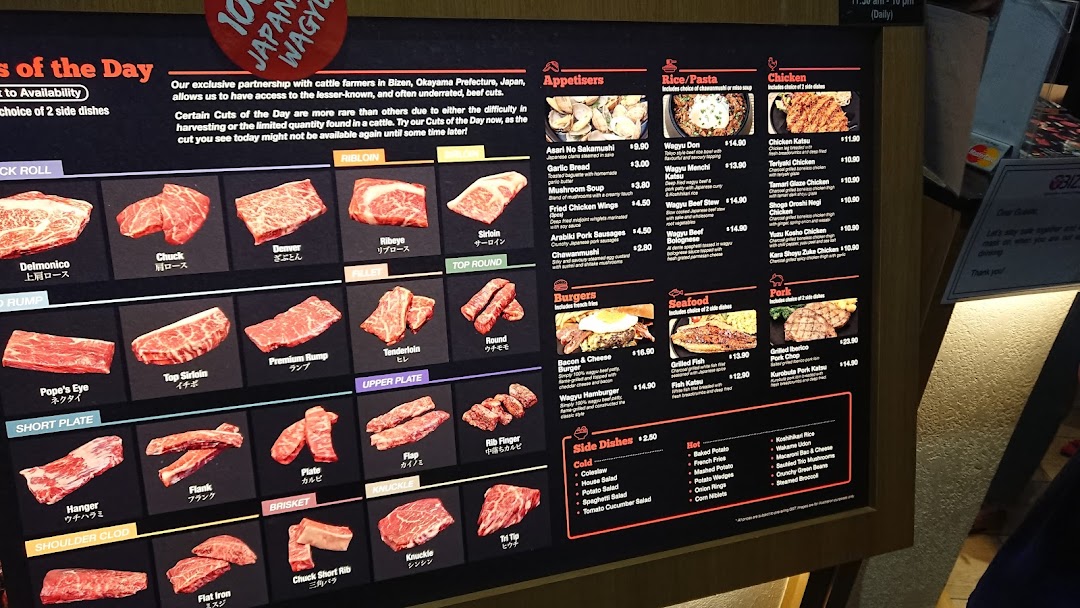 A detailed menu board showcasing various wagyu beef cuts, appetizers, and main dishes at Bizen Okayama Wagyu Steakhouse.