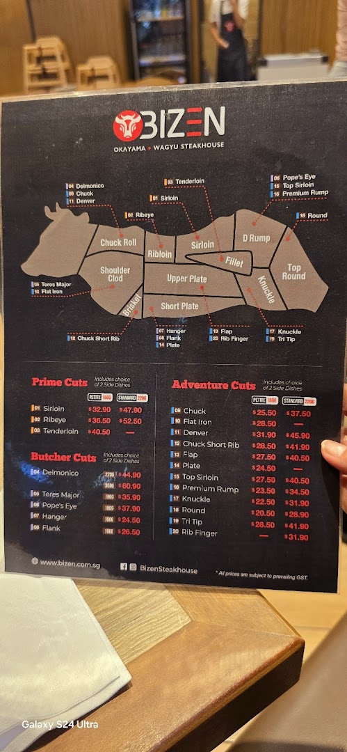 A detailed menu from Bizen Okayama Wagyu Steakhouse, showcasing various beef cuts and their prices.