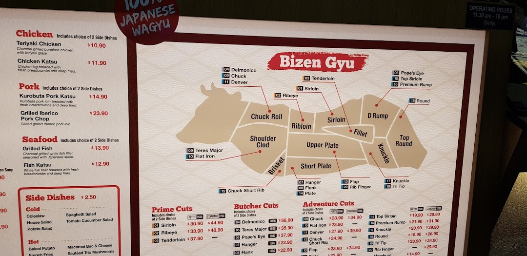 A detailed menu board showcasing various Japanese Wagyu beef cuts, chicken, pork, and seafood dishes.