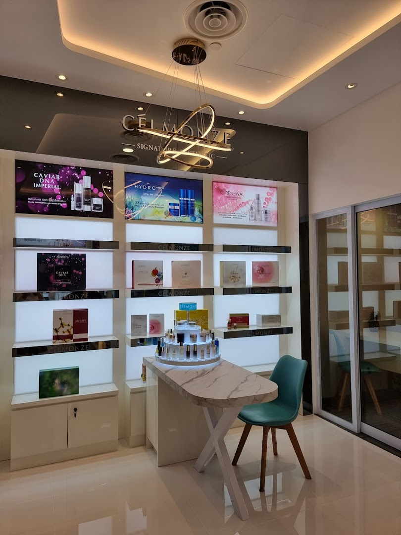 A modern, well-lit interior of Celmonze Signature, showcasing skincare products and a consultation area.