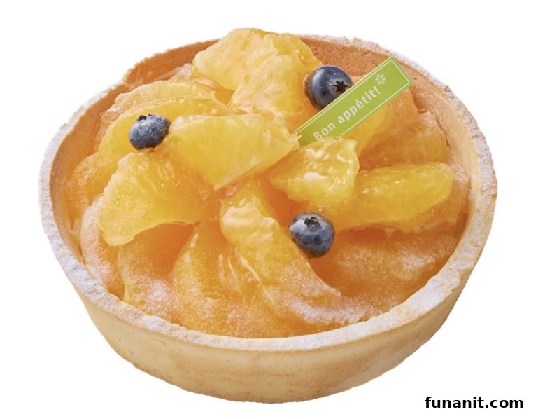 A vibrant fruit tart featuring juicy orange segments and fresh blueberries, dusted with powdered sugar.