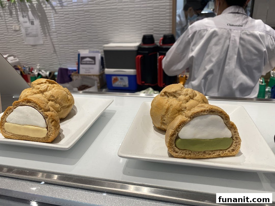 Delicious cream puffs with various fillings displayed on a counter at Châteraisé.