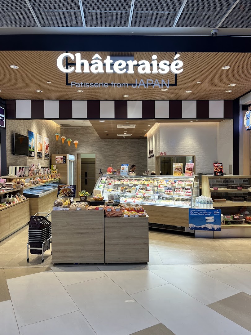 The inviting storefront of Châteraisé, a Japanese patisserie, showcasing its display cases filled with treats.