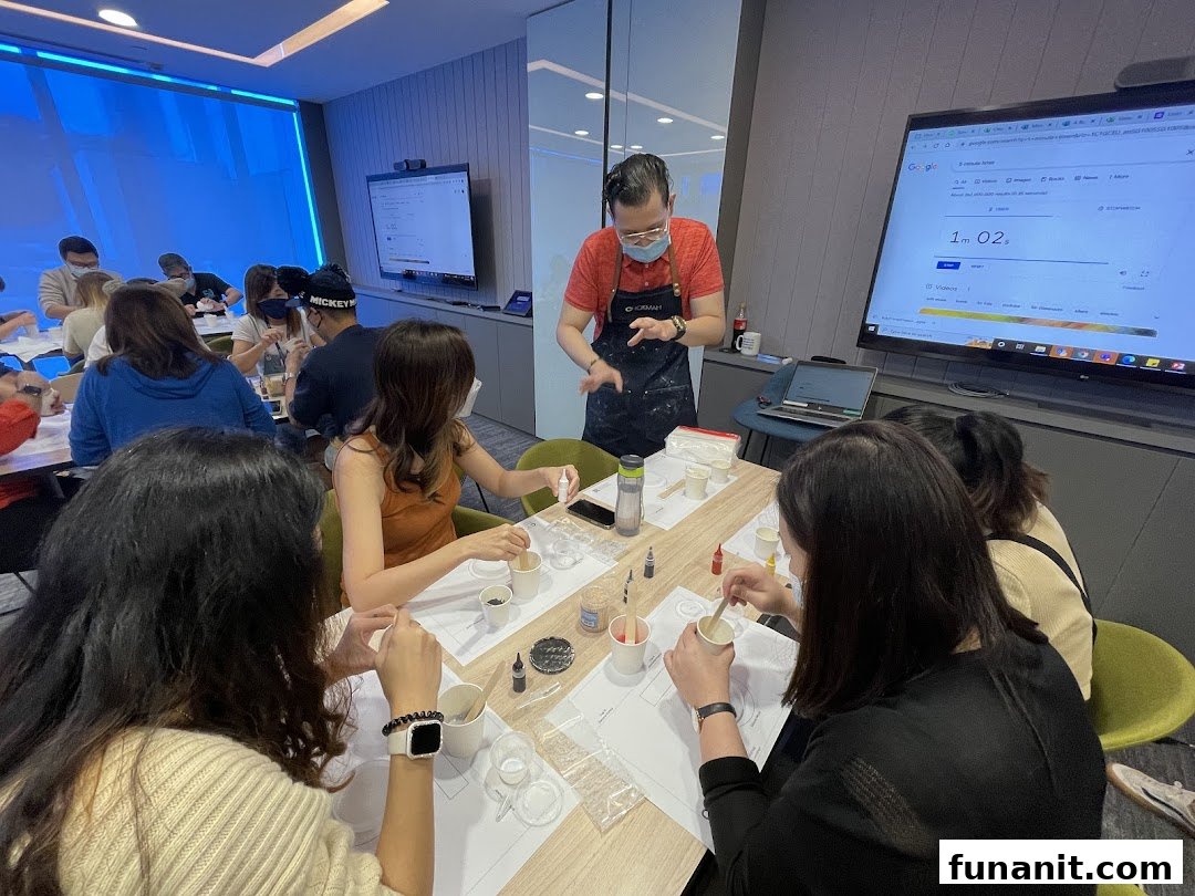 Participants engage in a creative workshop, mixing materials under instructor guidance.