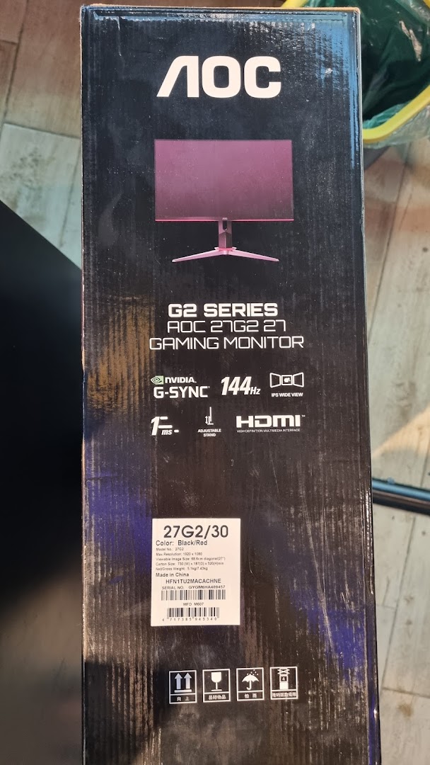 A close-up of an AOC G2 Series 27-inch gaming monitor box, highlighting its features.