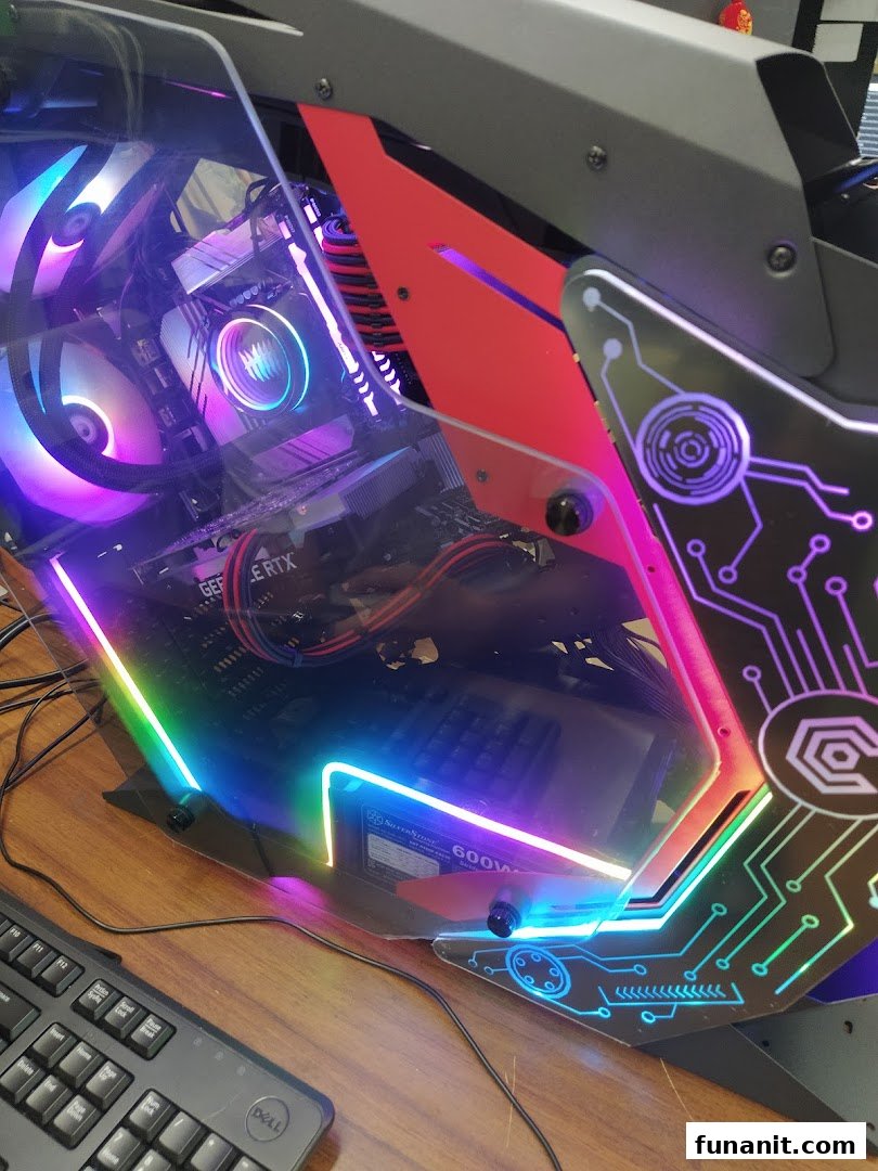 A vibrant gaming PC setup showcasing internal components with colorful RGB lighting and a sleek case design.