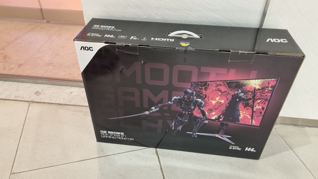 A large black box for an AOC G2 Series gaming monitor, featuring graphics and specifications.