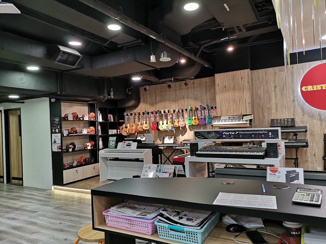 Interior view of Cristofori Music, showcasing various musical instruments like ukuleles, keyboards, and violins.