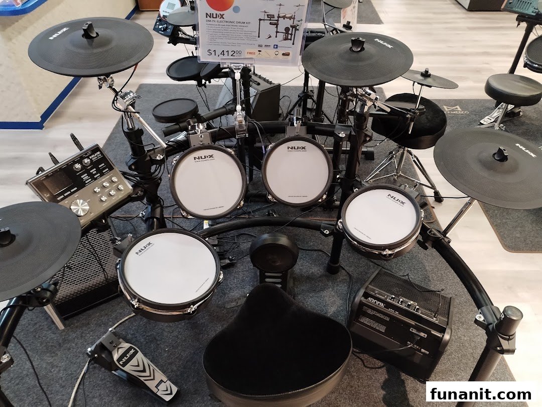 A NUX electronic drum kit displayed in a music store, ready for demonstration.