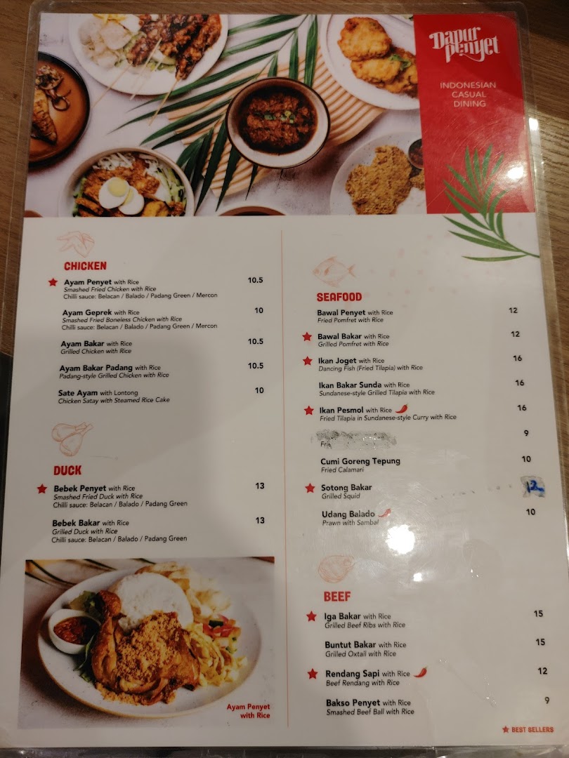 A detailed menu from Dapur Penyet, showcasing Indonesian chicken, seafood, duck, and beef dishes.