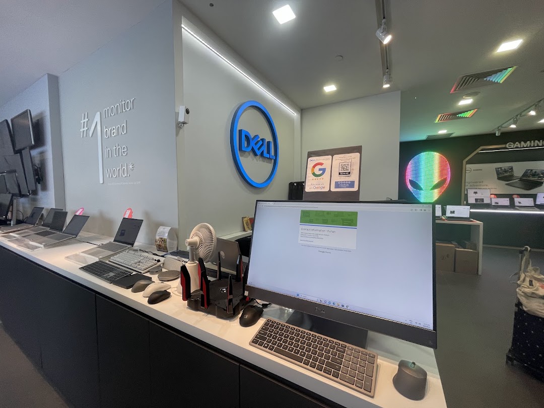 Interior view of Dell Exclusive Store Funan, showcasing laptops, monitors, and gaming setups.