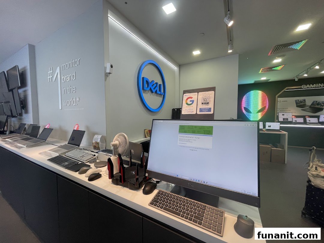 Interior view of Dell Exclusive Store Funan, showcasing laptops, monitors, and gaming setups.