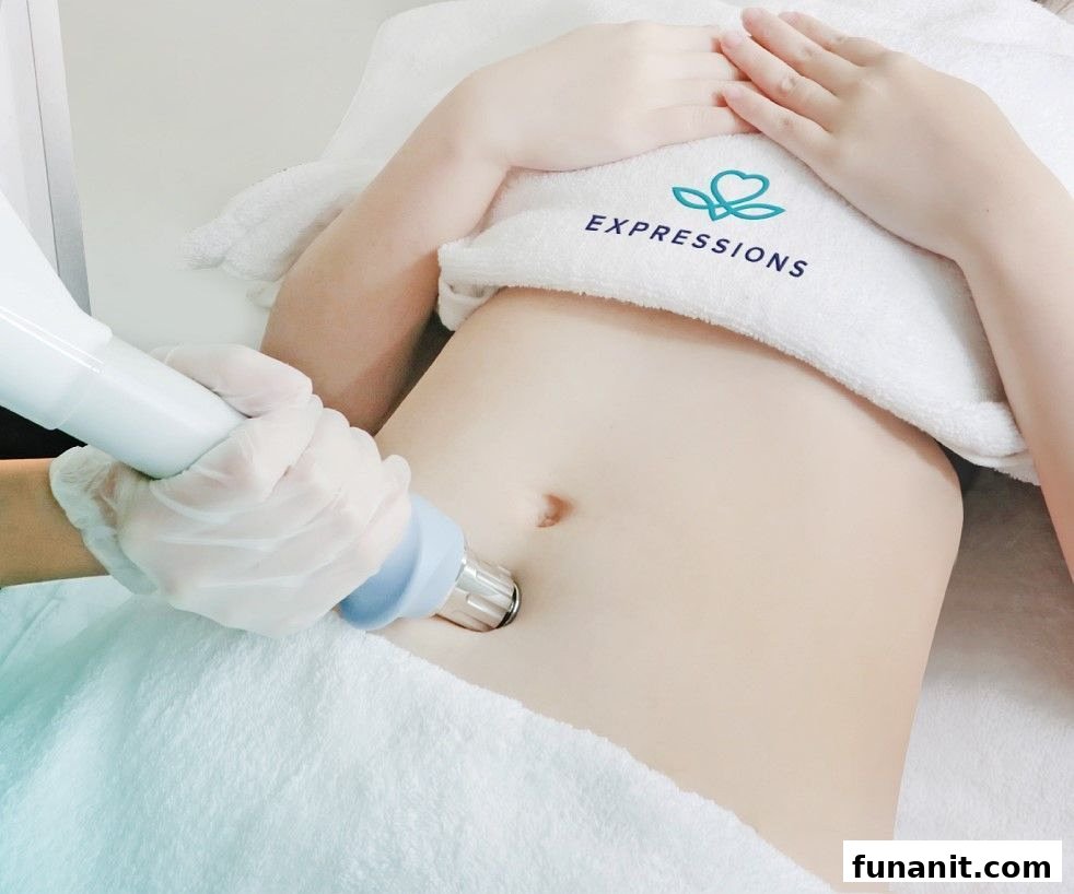 A person receiving a non-invasive slimming treatment on their abdomen at Expressions Funan.