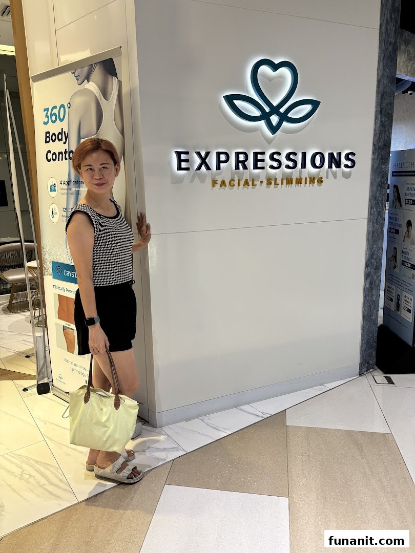 A woman stands by the entrance of Expressions Facial & Slimming, showcasing its prominent signage.