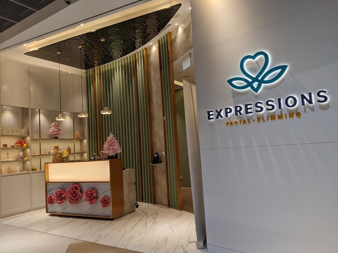 The illuminated entrance and reception area of Expressions Facial + Slimming, featuring a modern, inviting design.