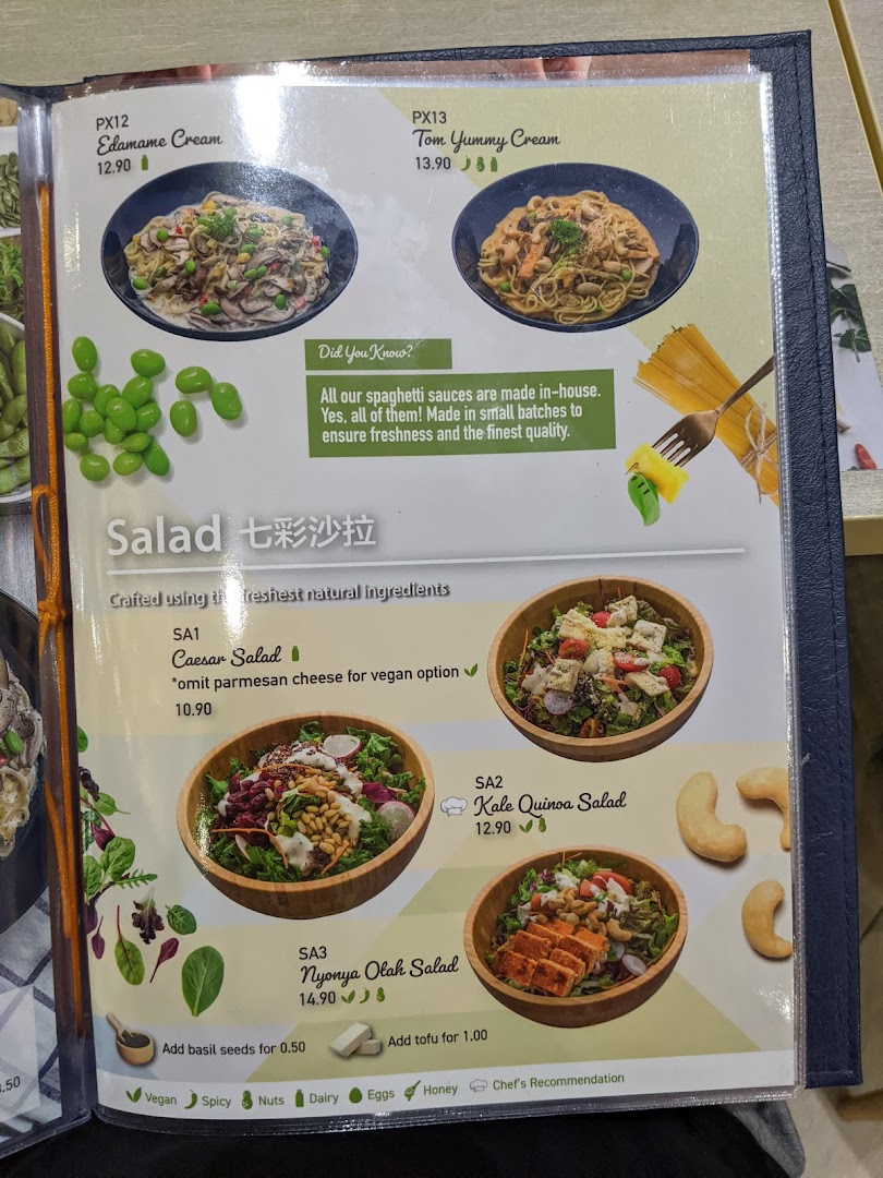 A menu page from Flavours by Saute, showcasing pasta and salad options with prices and dietary information.