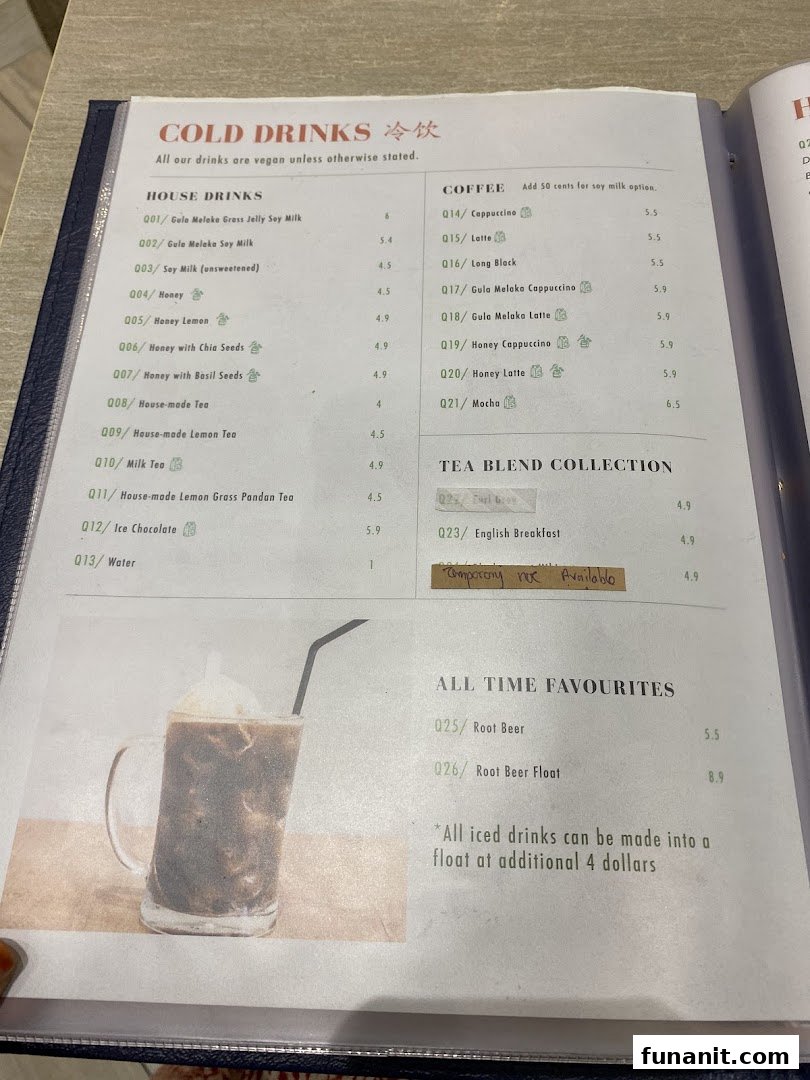A detailed menu page showcasing cold drinks, coffee, tea, and all-time favourites with prices.