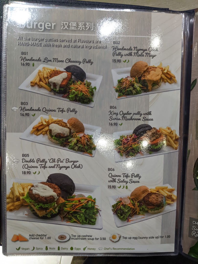 A menu page showcasing various gourmet burgers with descriptions, prices, and dietary information.