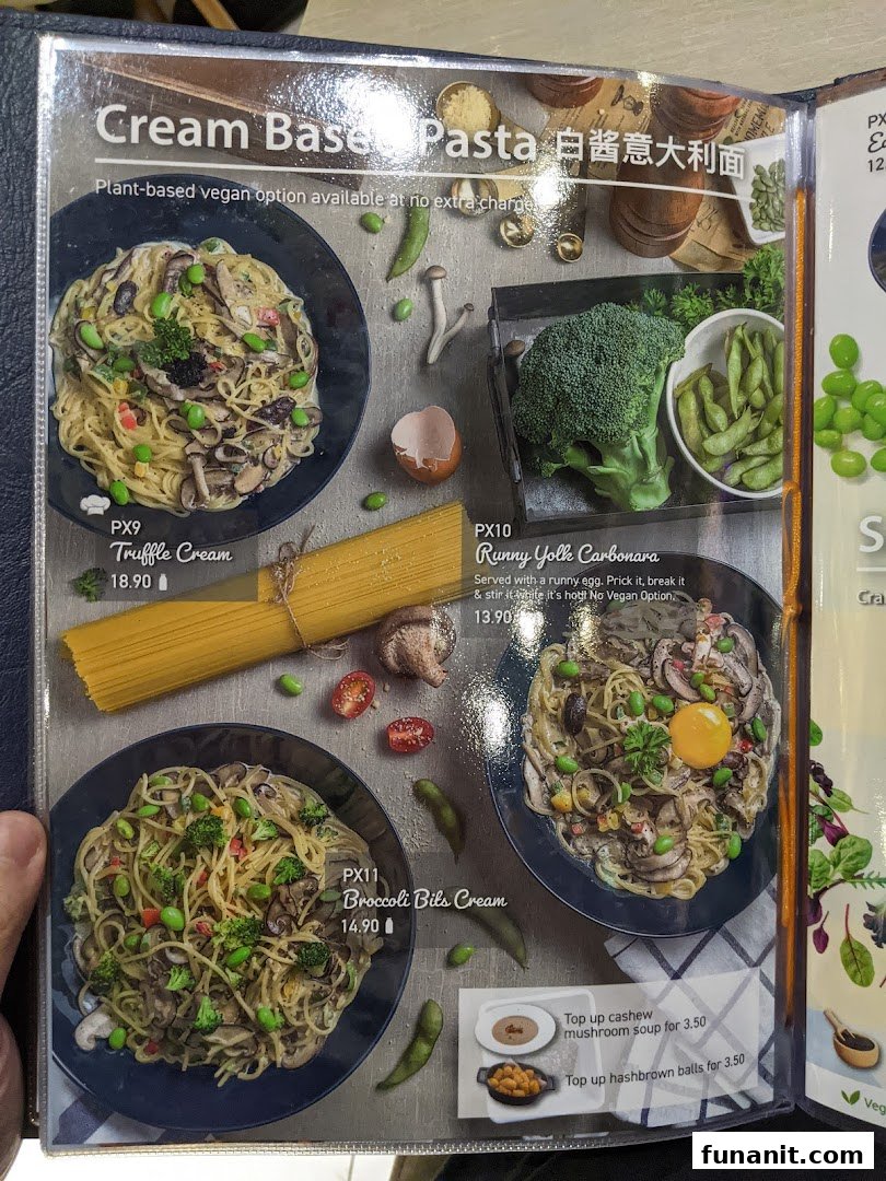 A menu page from Flavours by Saute showcasing various cream-based pasta dishes with vegan options.