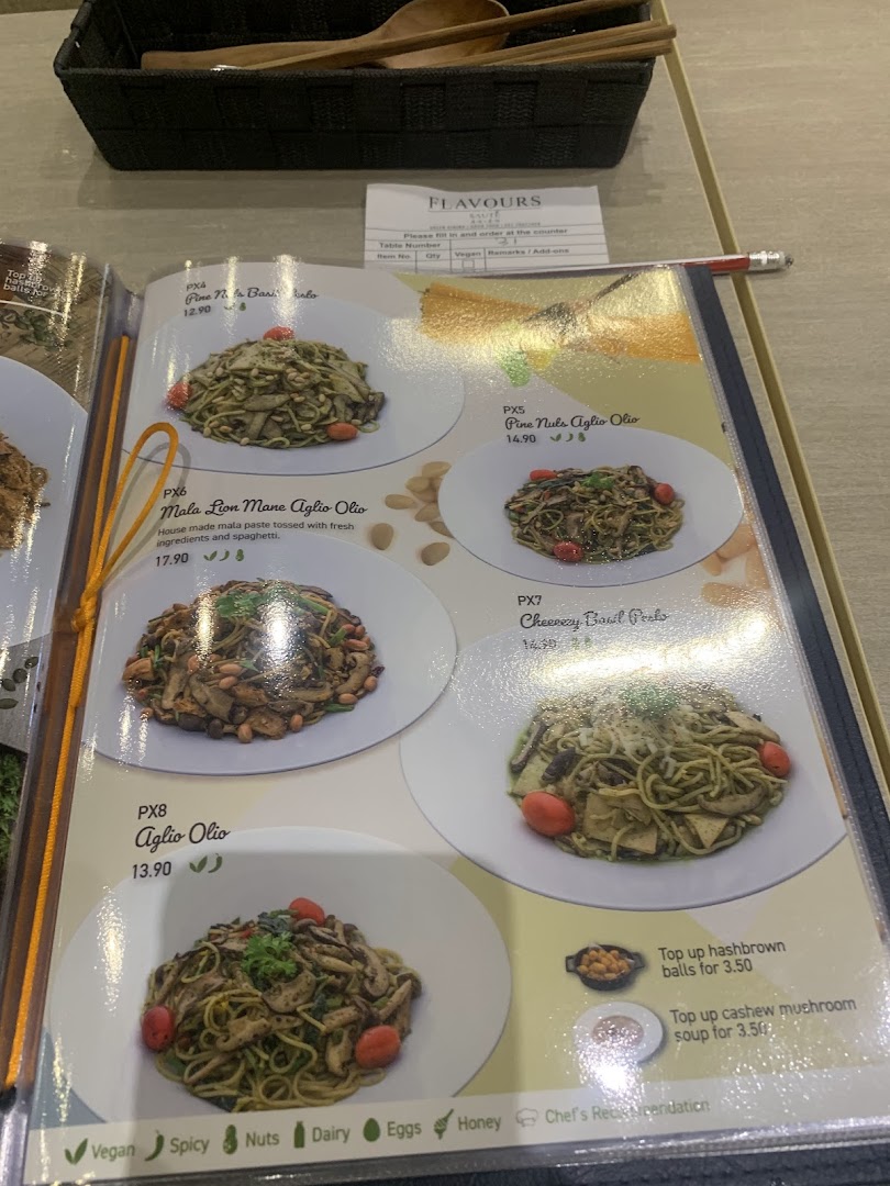 A close-up view of a menu page featuring various pasta dishes with prices and descriptions.