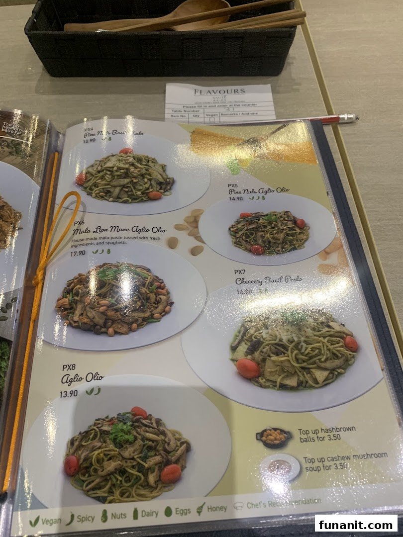 A close-up view of a menu page featuring various pasta dishes with prices and descriptions.