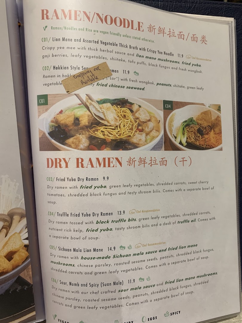 A menu page from Flavours by Saute, showcasing various vegan and vegetarian ramen and dry ramen dishes.