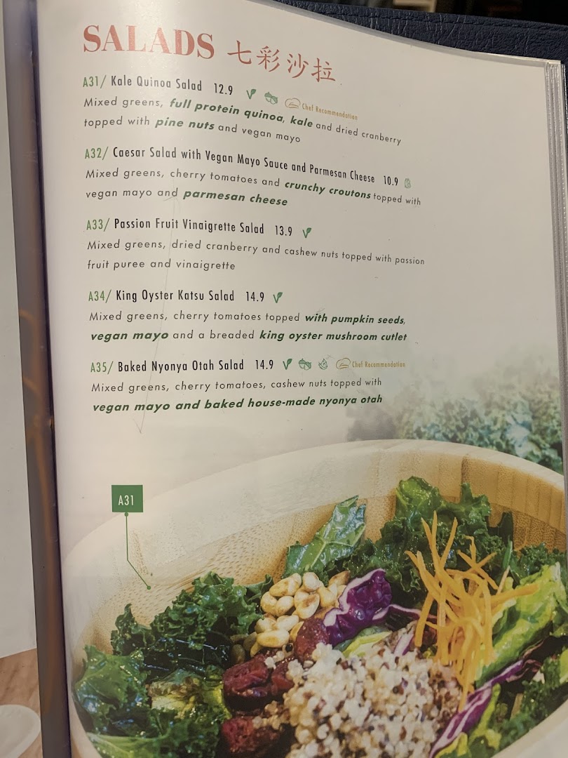 A menu page displaying a variety of healthy and flavorful salad options with descriptions and prices.