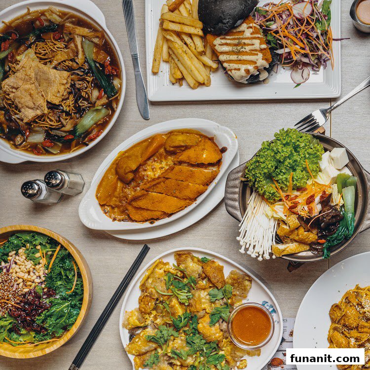 A vibrant spread of diverse vegetarian and vegan dishes, showcasing local and Western fusion cuisines.