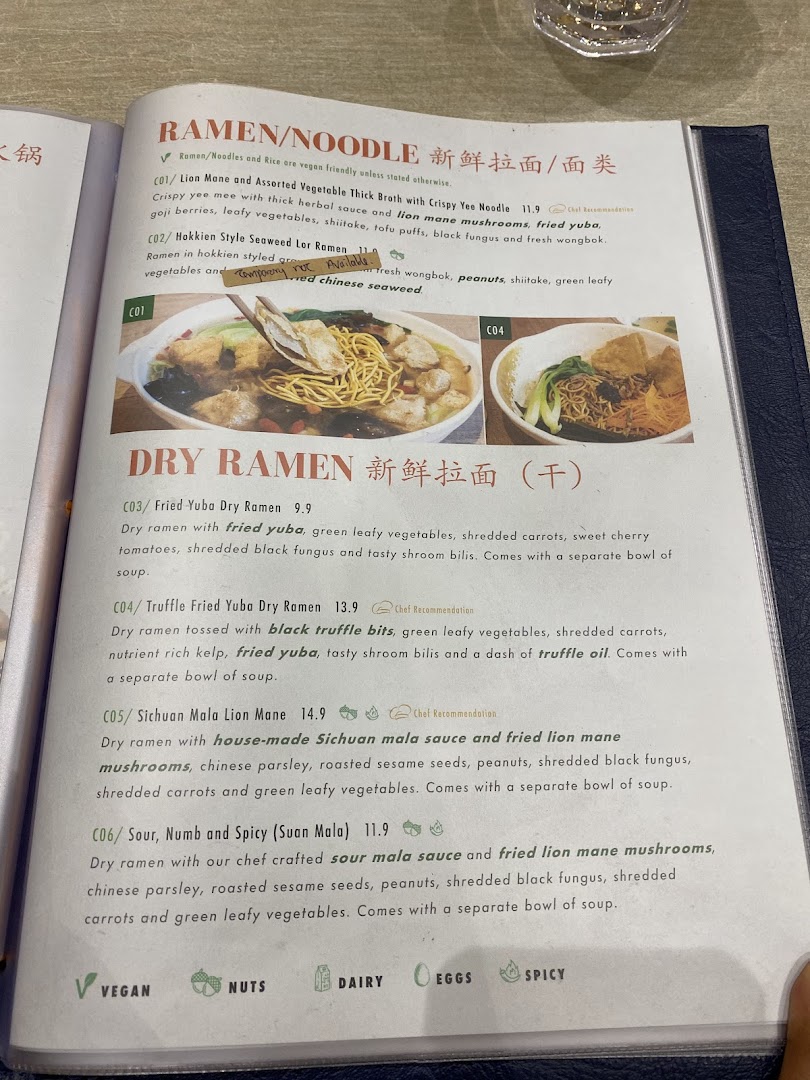 A menu page displaying various vegan and vegetarian ramen and dry ramen dishes with descriptions and prices.