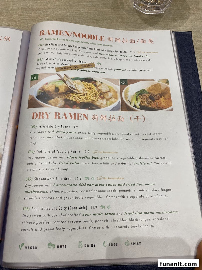 A menu page displaying various vegan and vegetarian ramen and dry ramen dishes with descriptions and prices.
