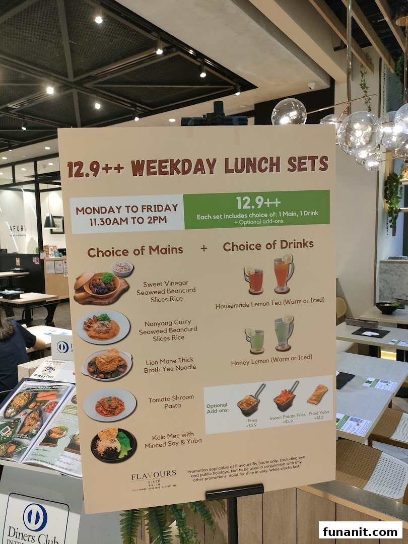 A large menu board displaying weekday lunch sets and options at Flavours by Saute.