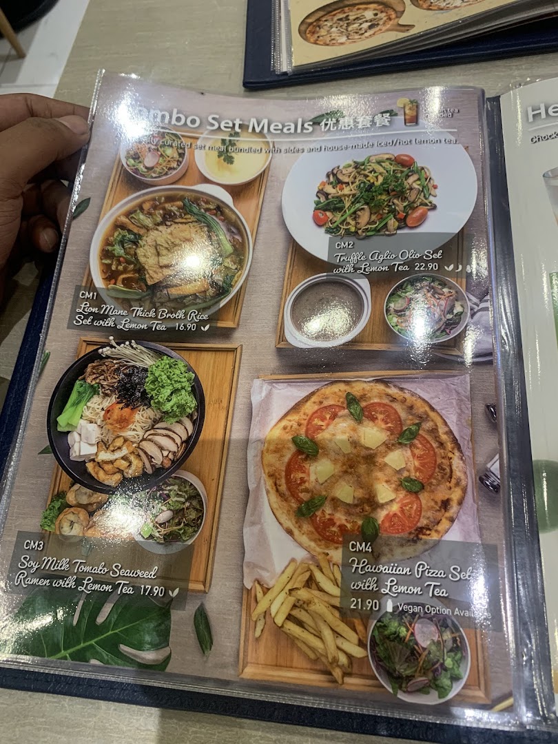 A vibrant menu page showcasing 'Jumbo Set Meals' with various fusion dishes and prices.
