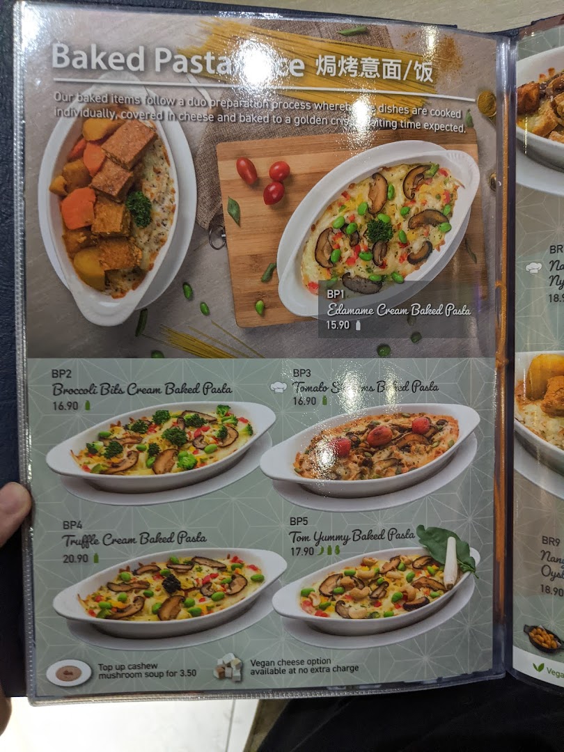 A menu page showcasing various baked pasta dishes with descriptions and prices.