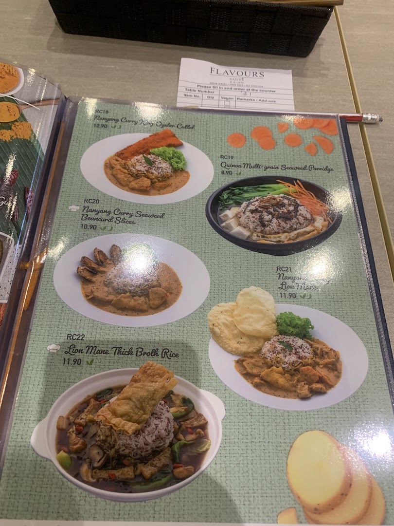 A menu page from Flavours by Saute, showcasing various vegetarian and vegan main dishes with prices.