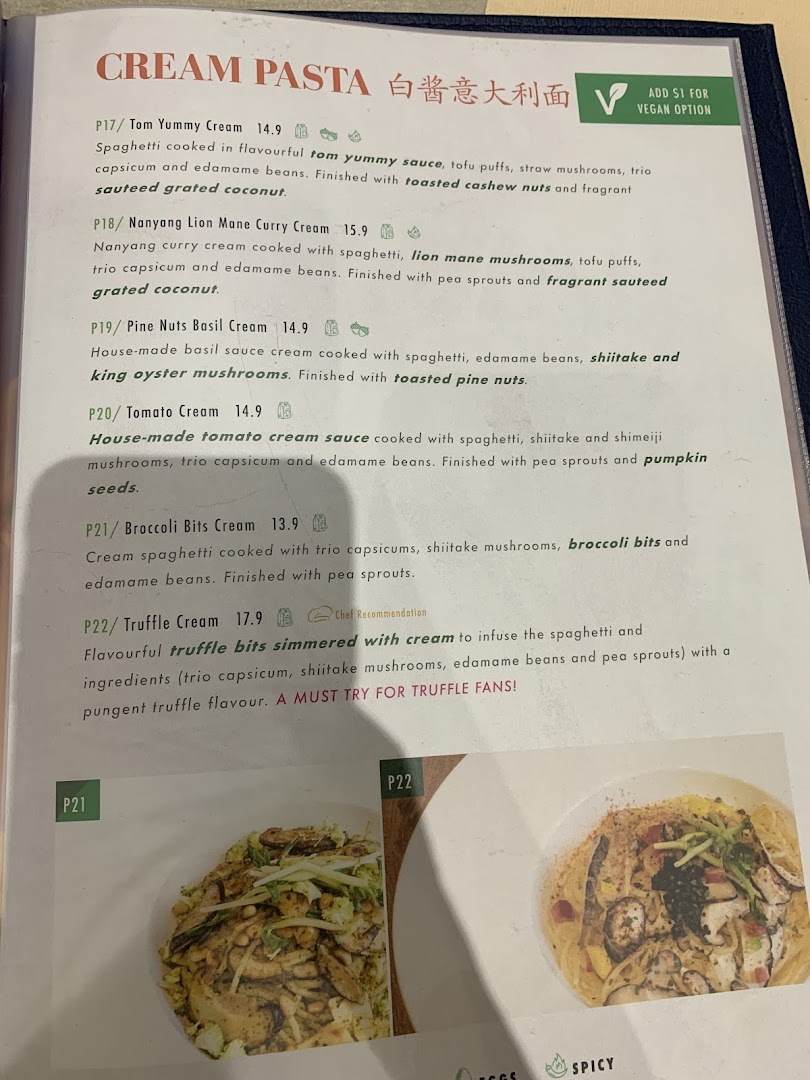 A menu page displaying a variety of cream pasta dishes with descriptions, prices, and dietary tags.