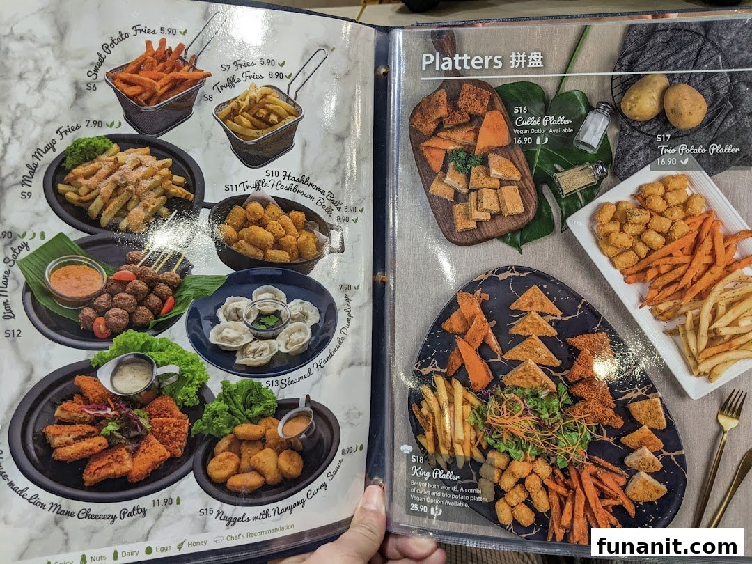 The image displays a variety of vegetarian and vegan dishes, including fries, hashbrowns, dumplings, and platters, from the restaurant's menu.