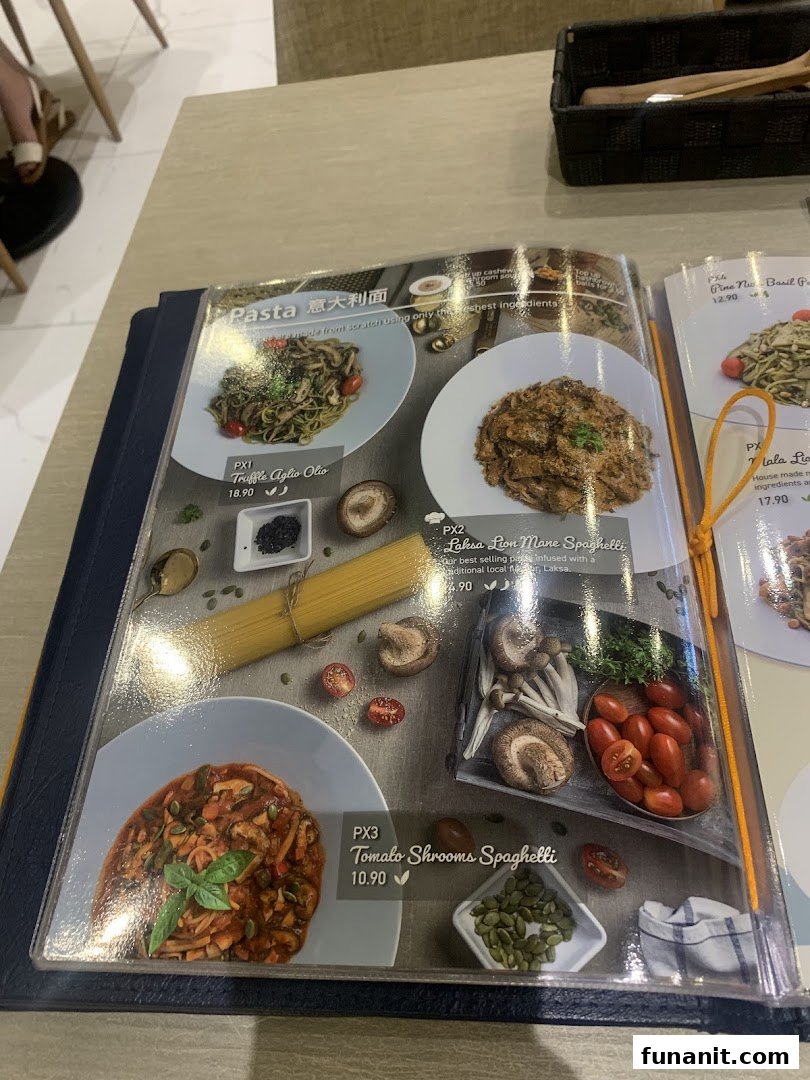 A menu page displaying various pasta dishes with their names, prices, and appetizing images.