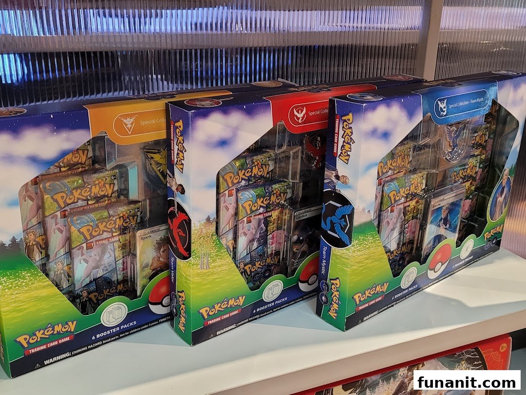 Three Pokémon Trading Card Game special collection boxes displayed on a shelf.