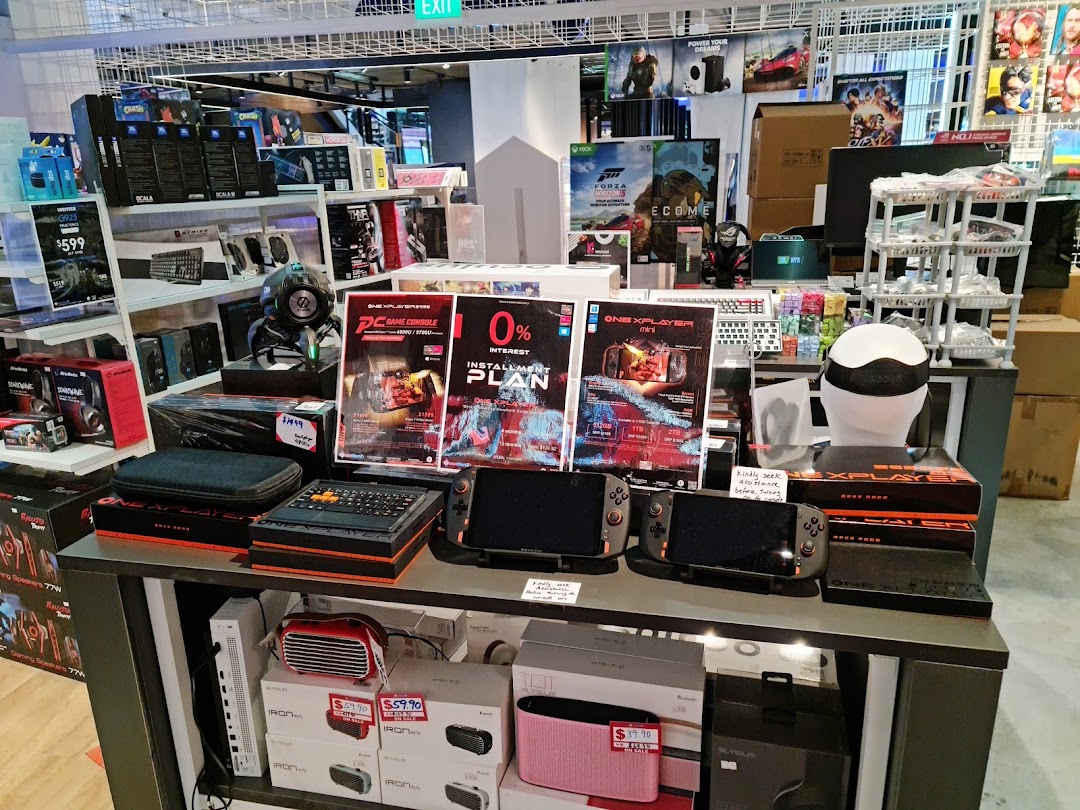 A vibrant display of gaming consoles, accessories, and electronics inside the GameMartz store.