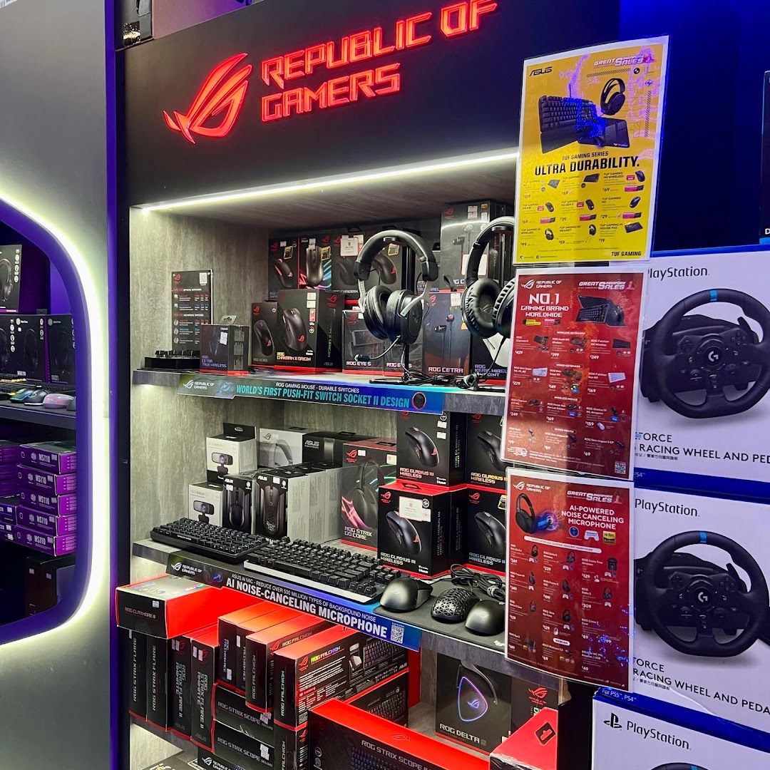 A vibrant display of gaming peripherals, including keyboards, mice, and headsets, under a 'Republic of Gamers' sign.