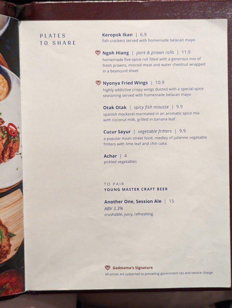 A close-up view of a menu page from Godmama, featuring Peranakan 'Plates to Share' and craft beer.