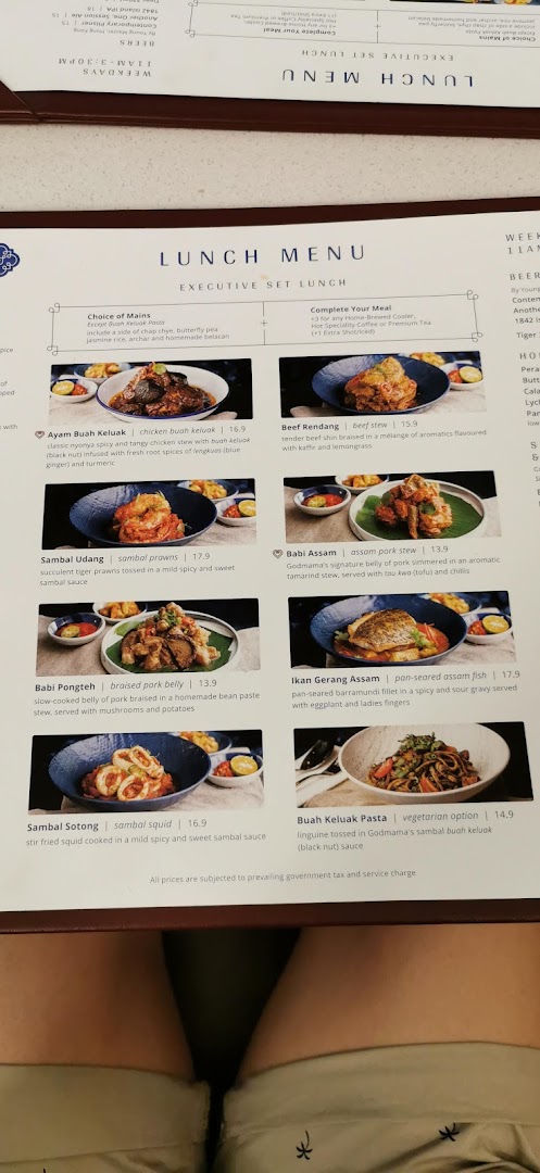 A detailed view of Godmama's Executive Set Lunch menu featuring various Peranakan dishes.