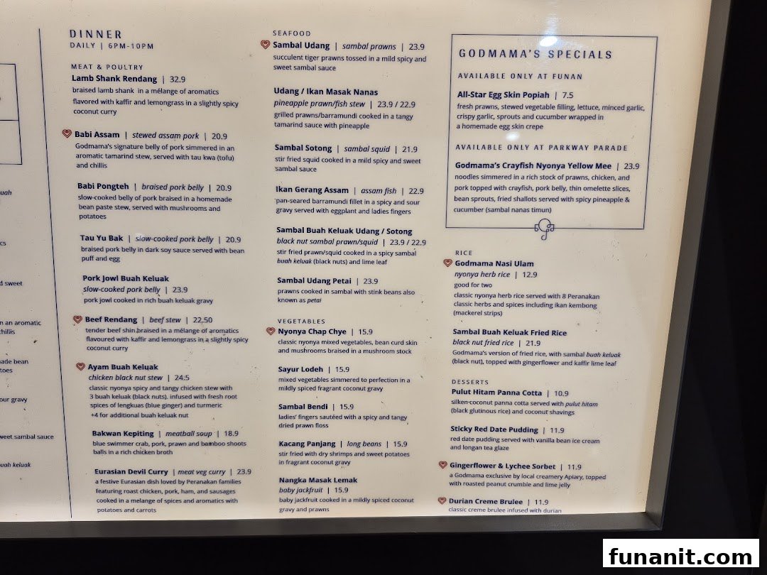 A detailed menu from Godmama, showcasing a variety of modern Peranakan dishes for dinner.