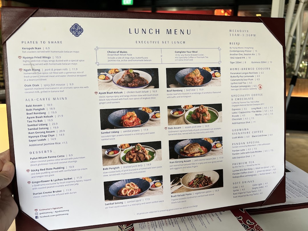 A detailed view of Godmama's lunch and ala-carte menu featuring Peranakan dishes, desserts, and beverages.