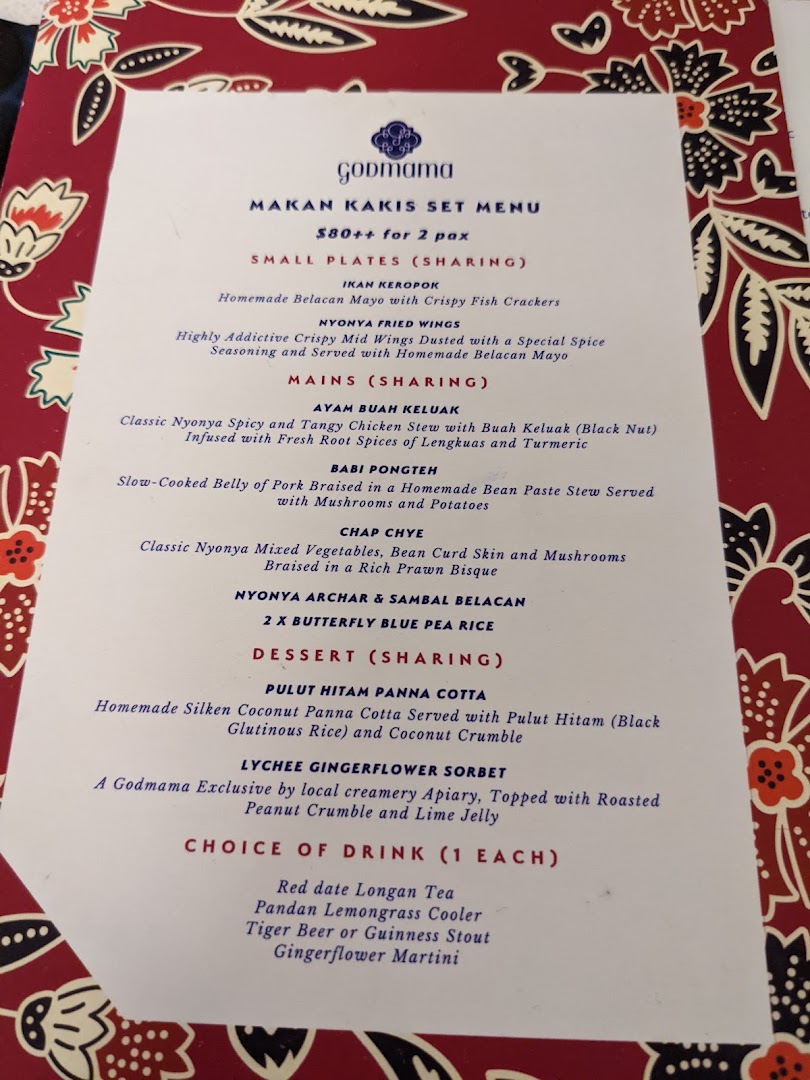 A detailed menu for Godmama's Makan Kakis Set Menu, featuring Peranakan dishes and drinks.